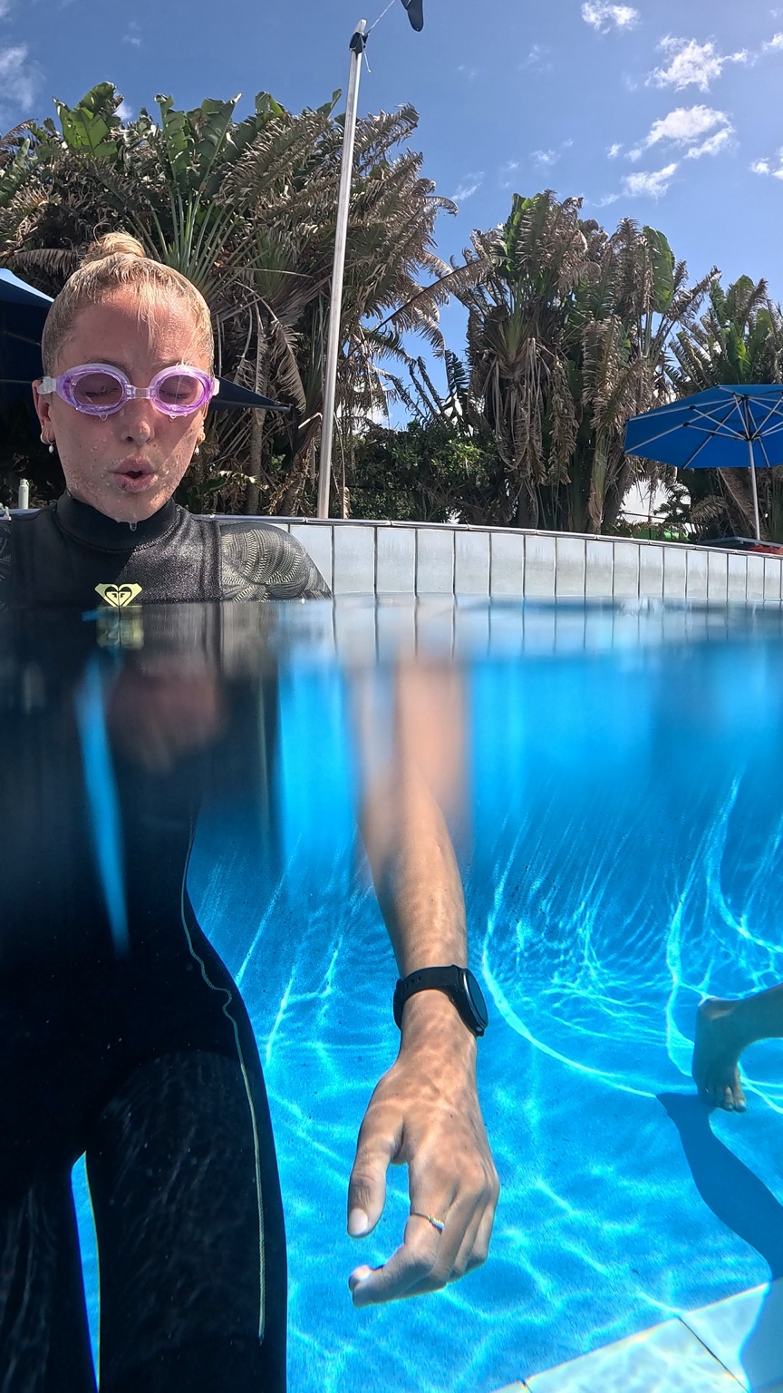 Leihani calmly practising recovery breathing at the surface after an underwater exercise